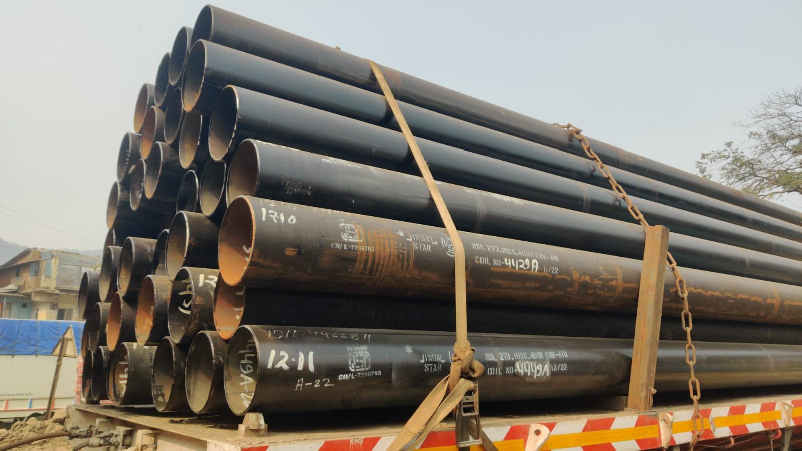 IS 3589 / IS 1239 ERW steel pipes stenciled on transport trailer for delivery